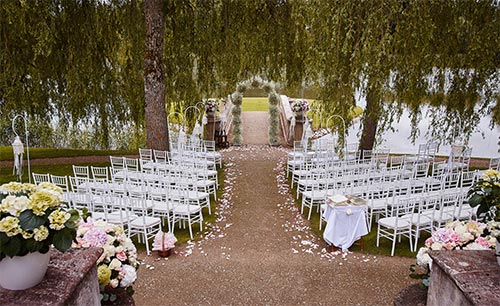 Photographe Mariage haut de gamme Rennes - Photo de la réception en extérieur dans un parc